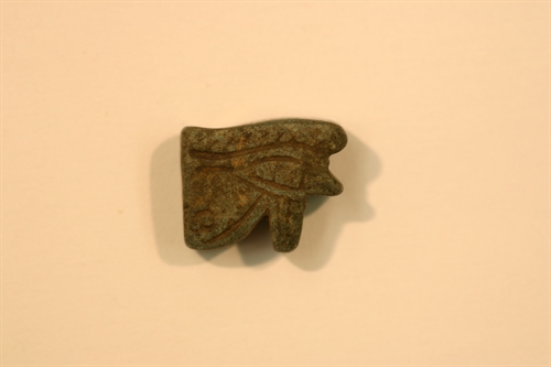 Udjat-eye amulet from grey-brown faience